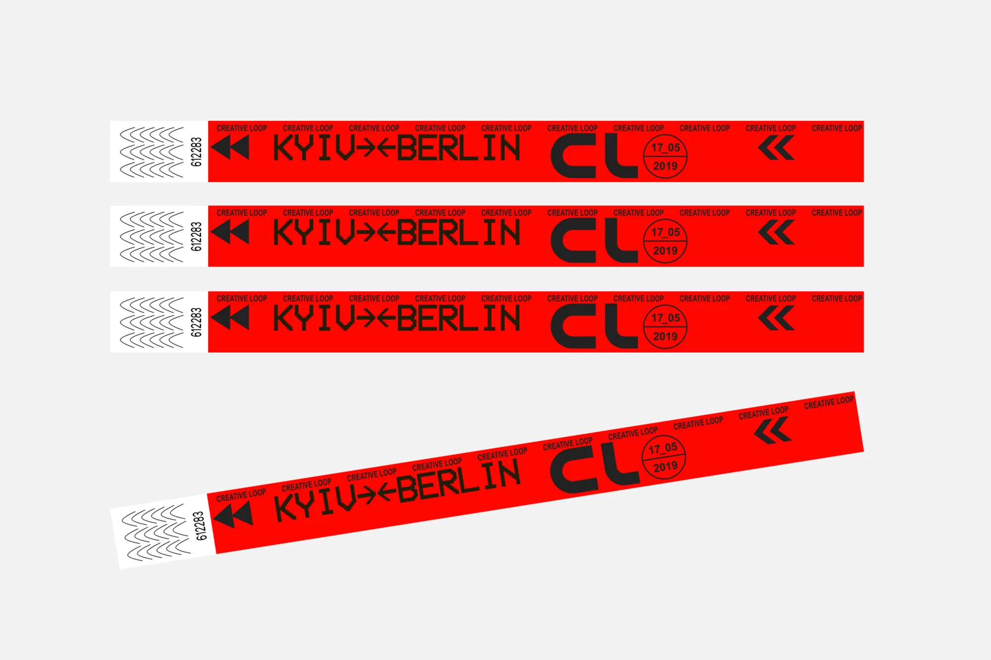 Creative Loop wristbands in red and black featuring KYIV to BERLIN text and a 17.05.2019 date stamp against a plain white backdrop.