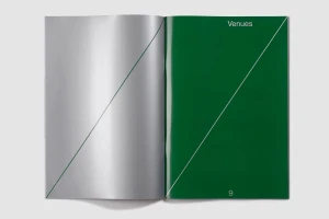 Open magazine spread showing a silver left page and a solid green right page with diagonal lines and the text Venues.