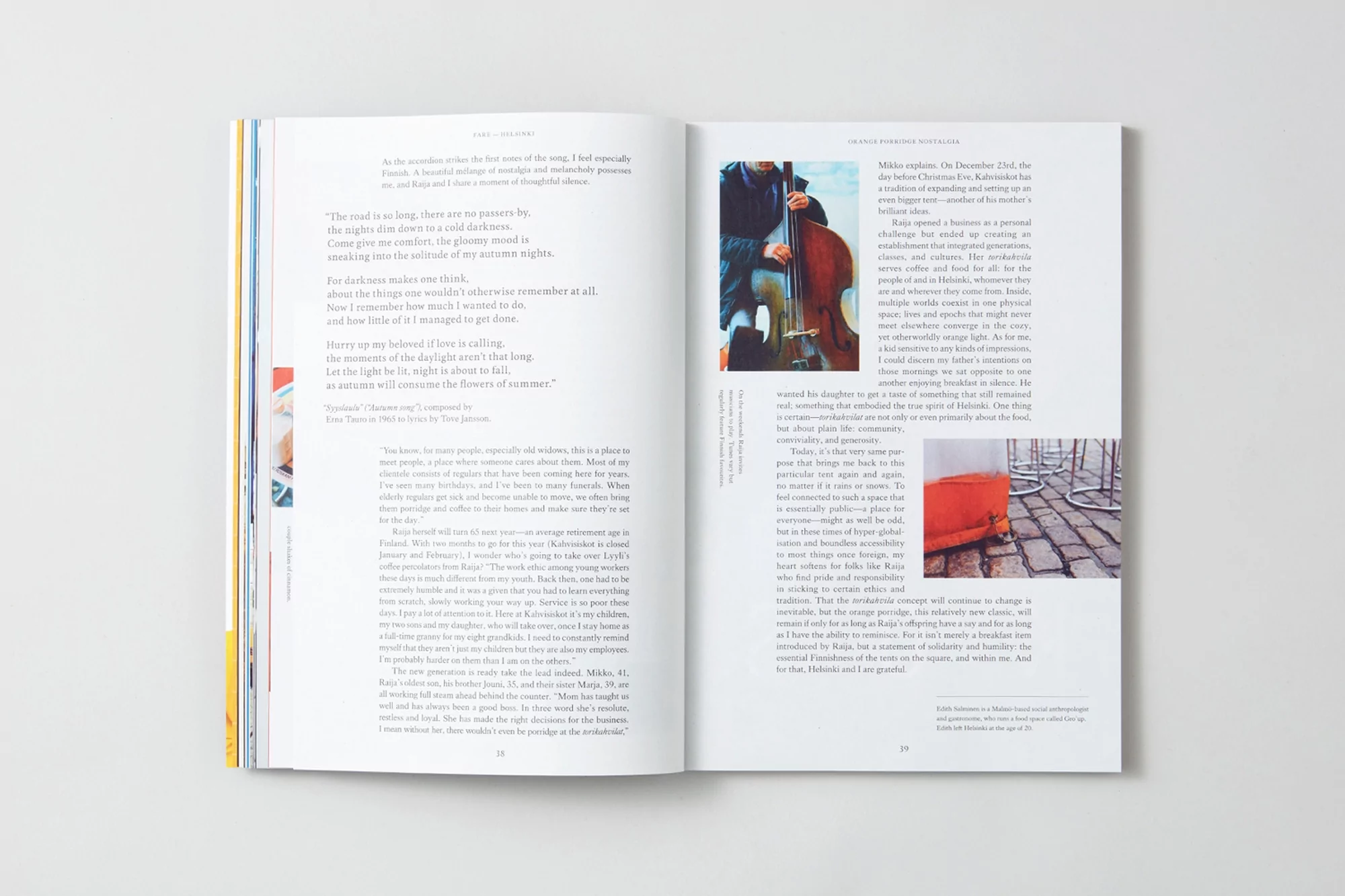 Open pages of a magazine featuring a cellist and an orange container, set against a backdrop of literary text and muted hues.