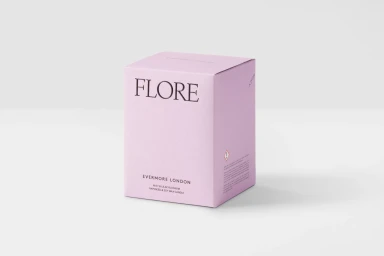 Lilac product packaging box for Evermore London candle featuring typography against a white background.