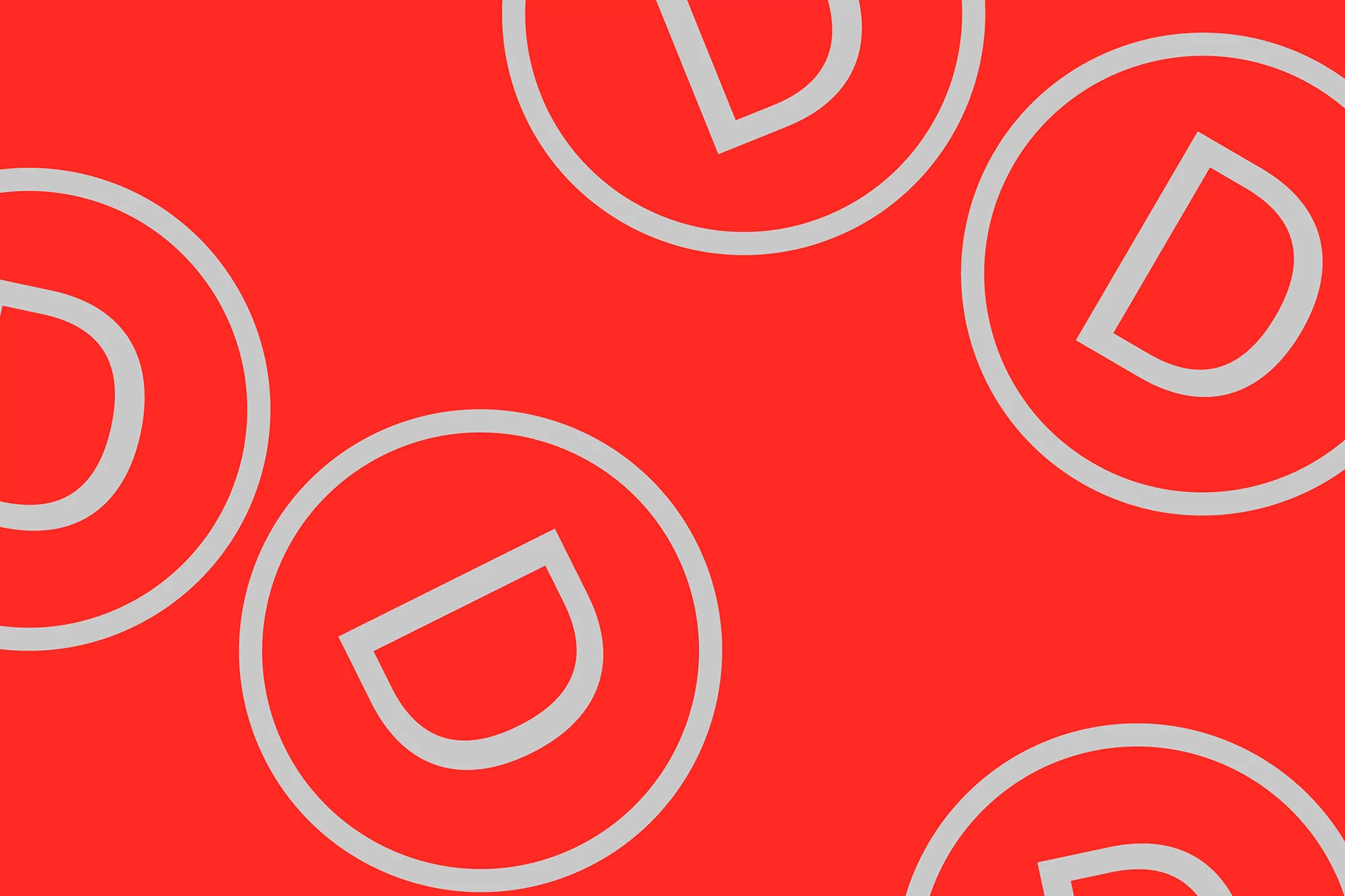 Red background with a repeating pattern of gray letter D's inside of circles. The image has a modern, graphic design aesthetic.