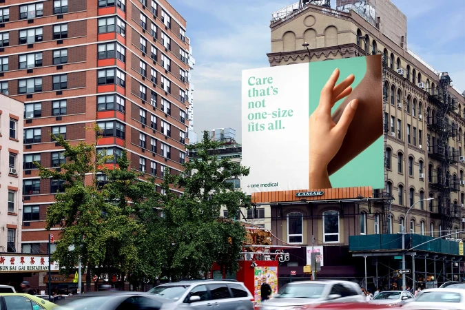 Urban billboard advertises healthcare with a focus on personalized medicine, featuring a diverse hand against a modern city backdrop.