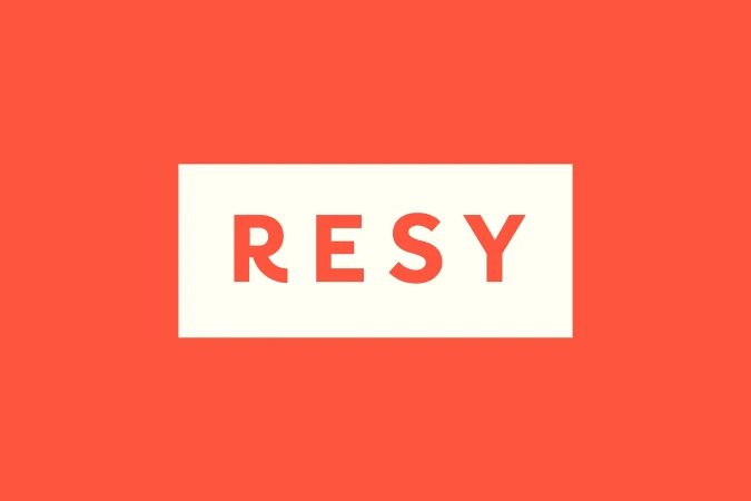 Resy logo with orange background and white rectangle containing the Resy text in orange font. Clean, graphic, and modern design.