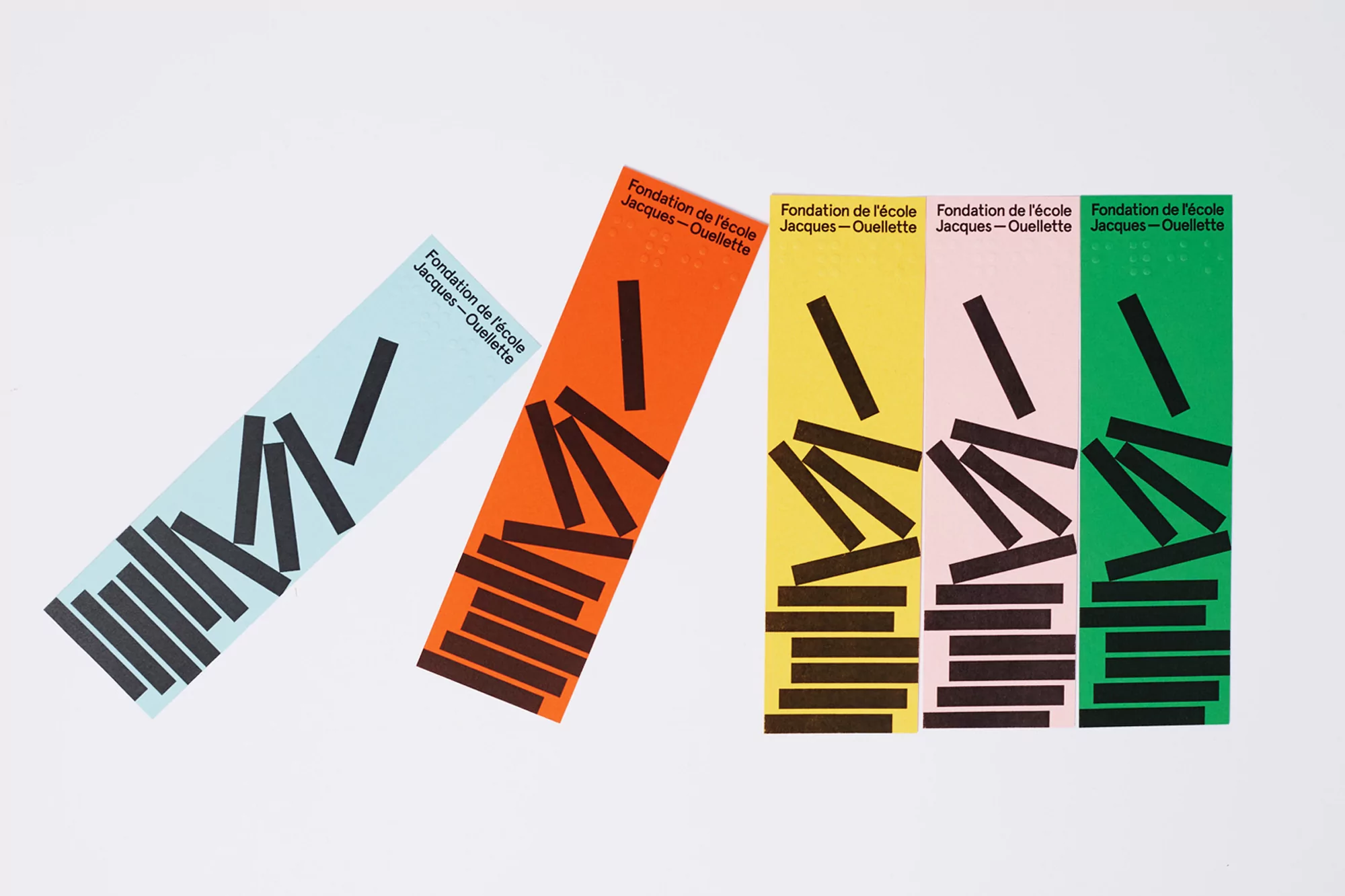 Colorful graphic art featuring vertical bookmarks with repeating black bars, each with the text 'Fondation de l'ecole Jacques-Ouellette'.
