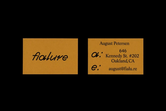 Two orange business cards featuring black typography against a solid black background, showcasing branding for Fialure.