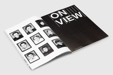 Open magazine spread displaying nine framed portrait photographs and bold typography reading ON VIEW on a black background.