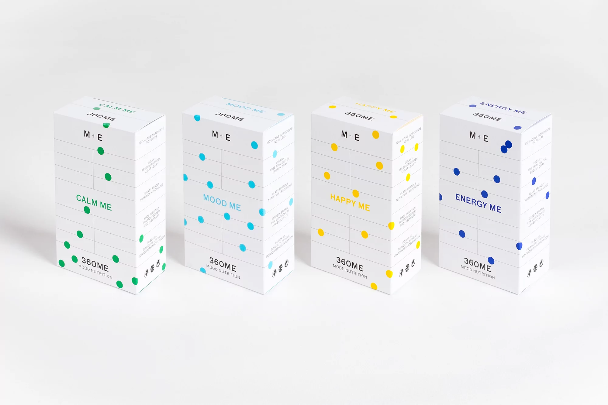 Four white boxes with different colored dot patterns and product names including Calm Me, Mood Me, Happy Me and Energy Me.