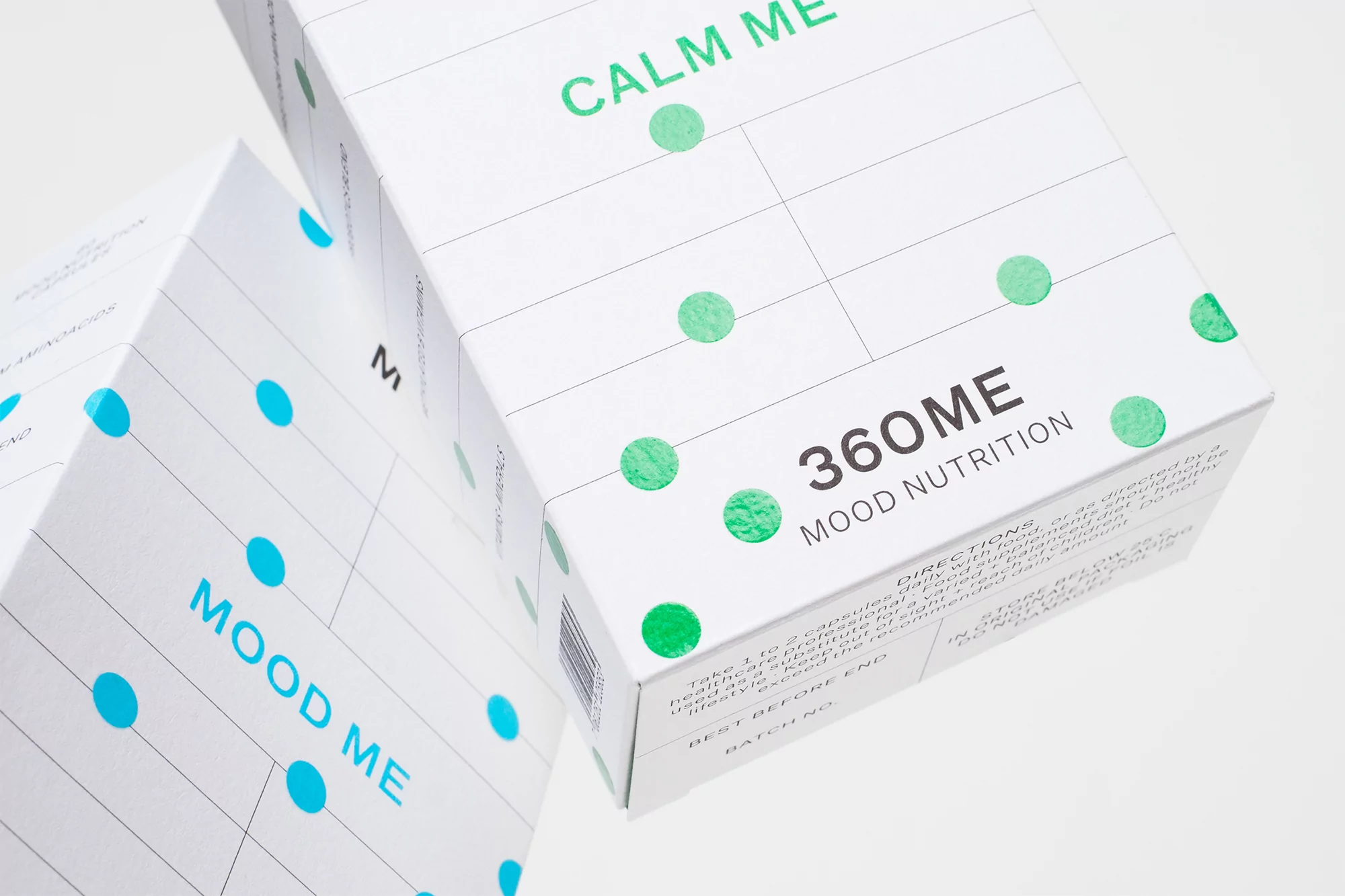Two white boxes of 360ME Mood Nutrition supplements are shown with green and blue dots, and text reading 'Calm Me' and 'Mood Me'.