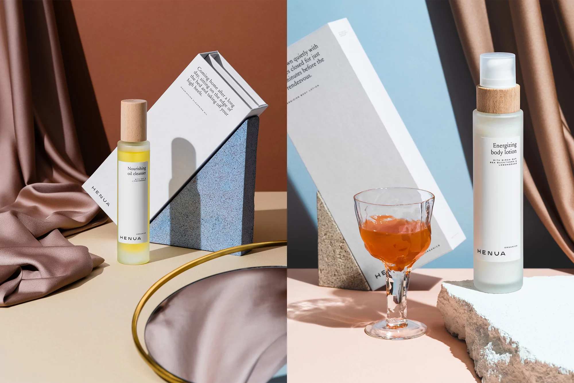 Studio shot of two Henua organic skincare product bottles with boxes, on a beige surface with peach and blue backgrounds and props.