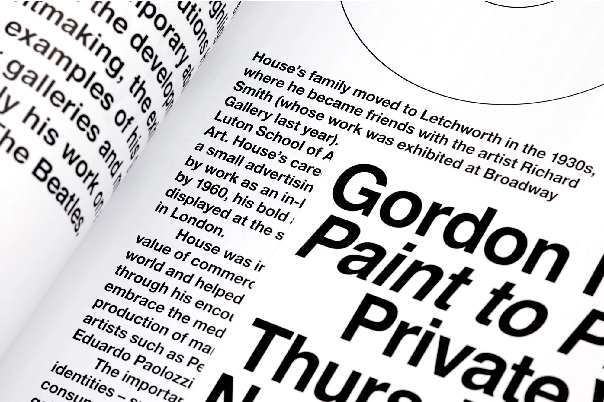 Open book featuring bold black typography on white pages, detailing an art exhibition of Gordon House's work, with additional text on the left.