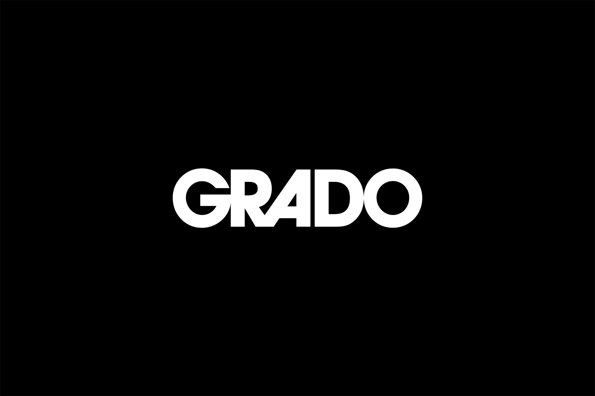Grado logo in white against a black background. The company name is displayed in a bold, sans-serif font.