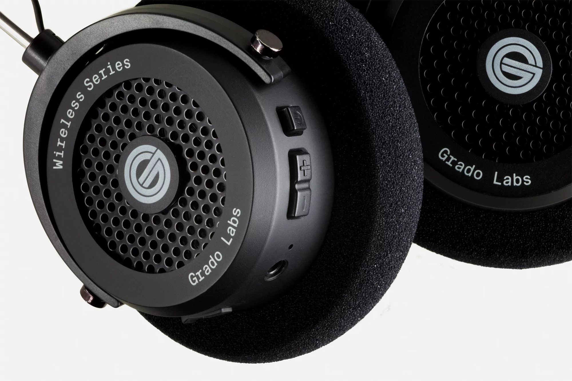 Grado Labs wireless series headphones in black. Studio shot showcasing the audio equipment with close-up details and branding.