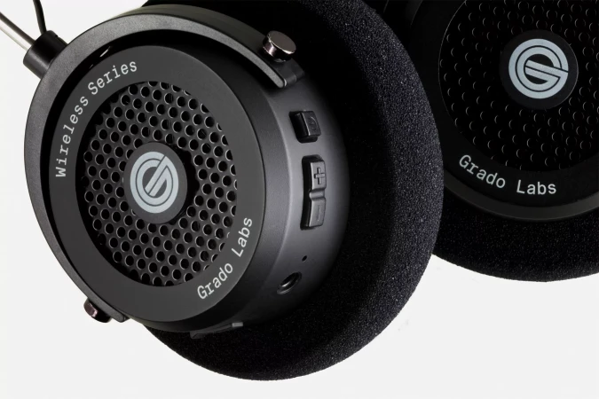 Grado Labs wireless series headphones in black. Studio shot showcasing the audio equipment with close-up details and branding.