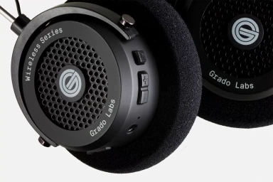 Close-up product shot of Grado wireless over-ear headphones with black ear cushions against a plain white background