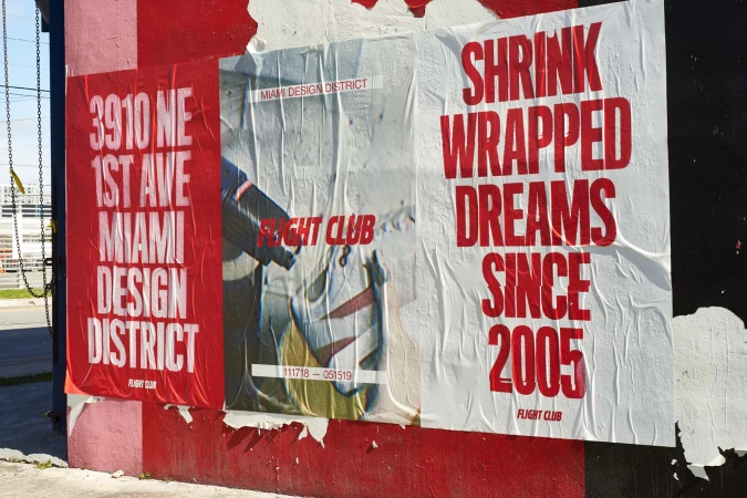Outdoor urban art installation featuring Miami Design District signage and Flight Club sneaker advertisement, bold colors, and street photography style.