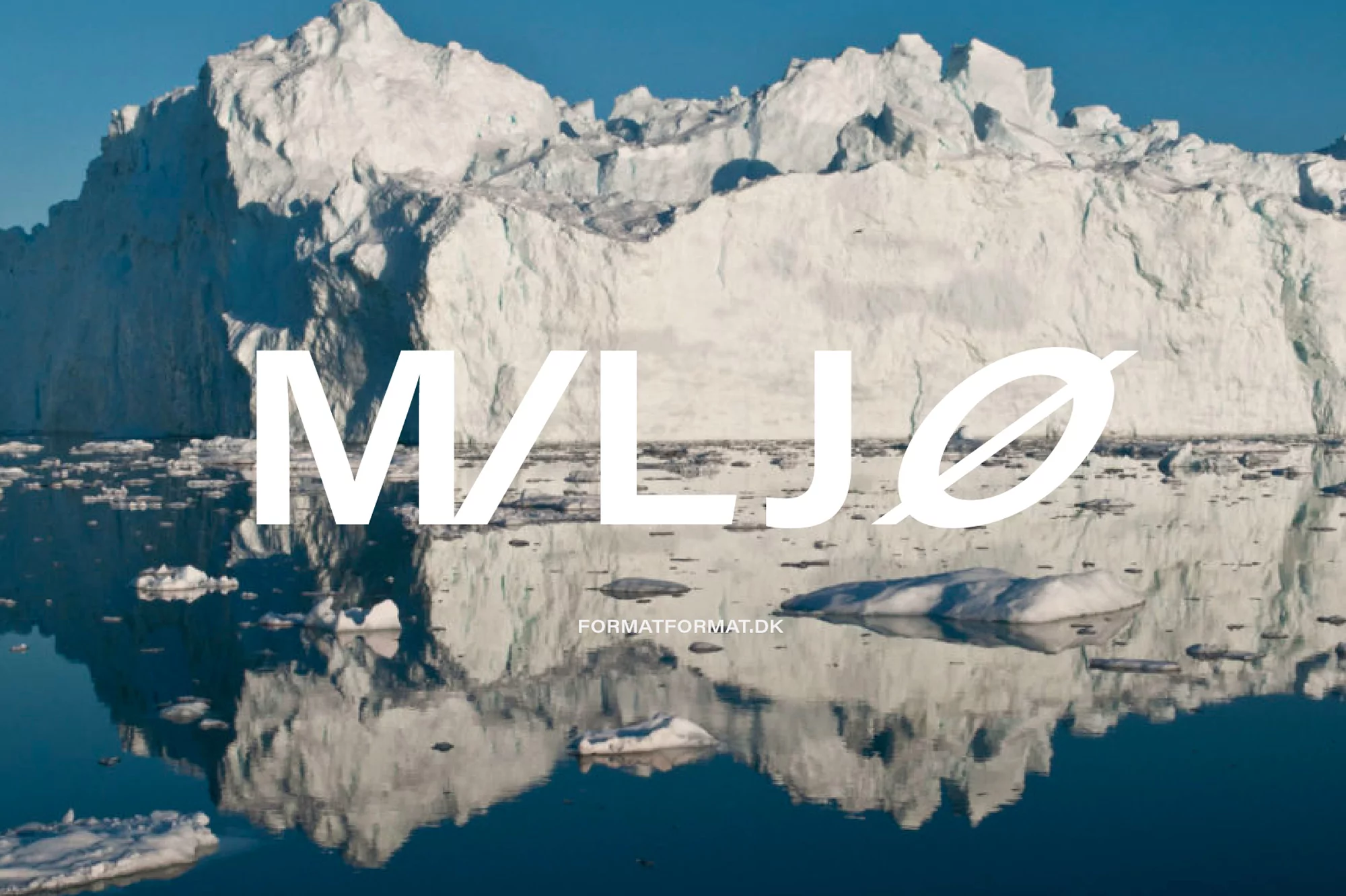 Icebergs reflected in the water under a blue sky, with the large white text "M/LJO" overlayed on the landscape, outdoor shot.
