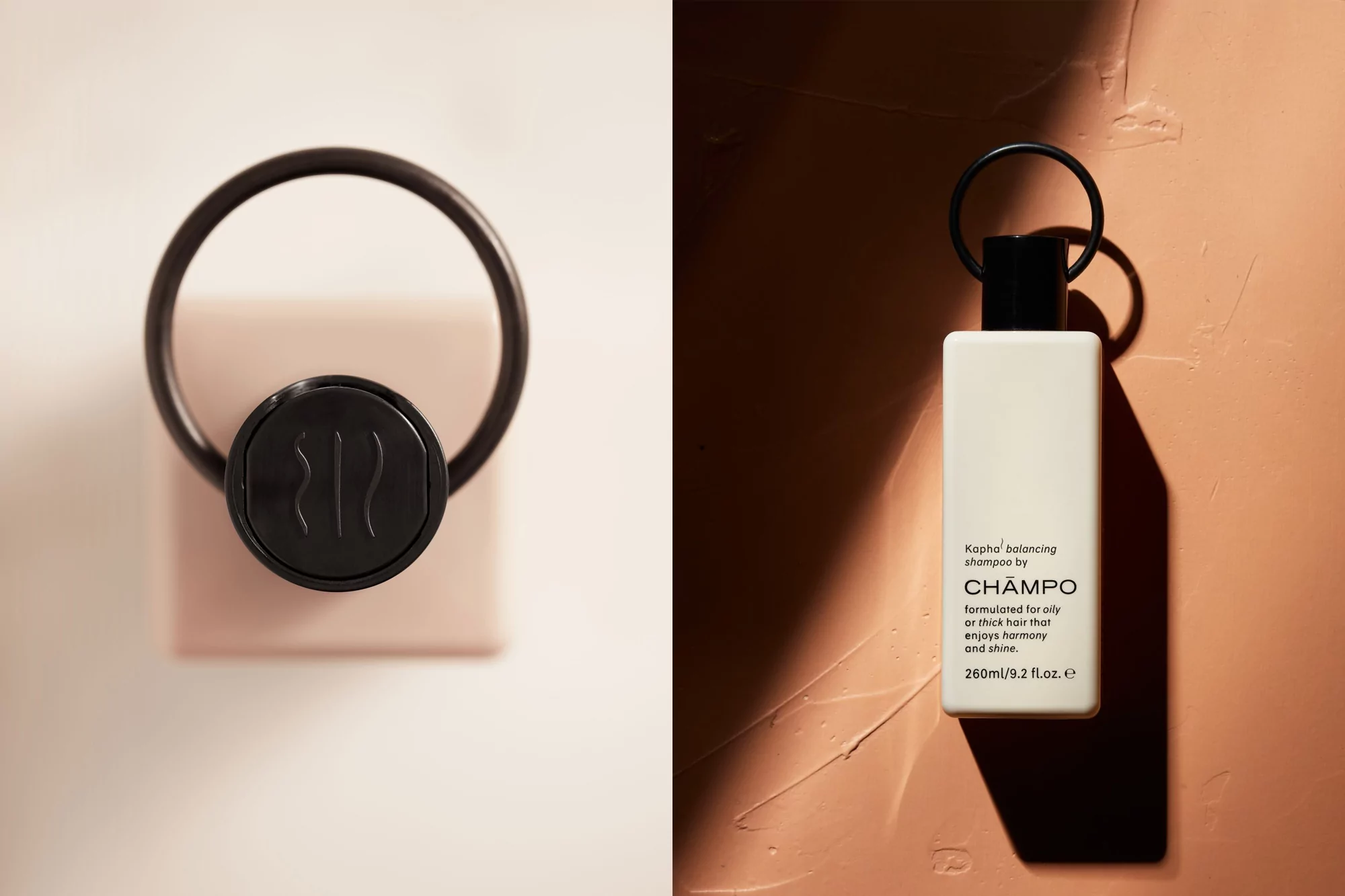 Champo shampoo bottle on a pink textured surface, featuring minimalist branding, studio lighting, and a complementary black hair tie.