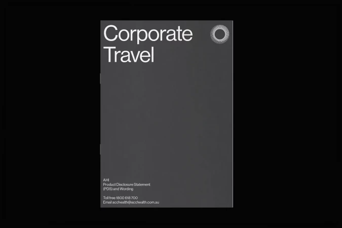Corporate Travel ad. Dark gray vertical ad with white text reading 'Corporate Travel,' company information, and a circular logo.