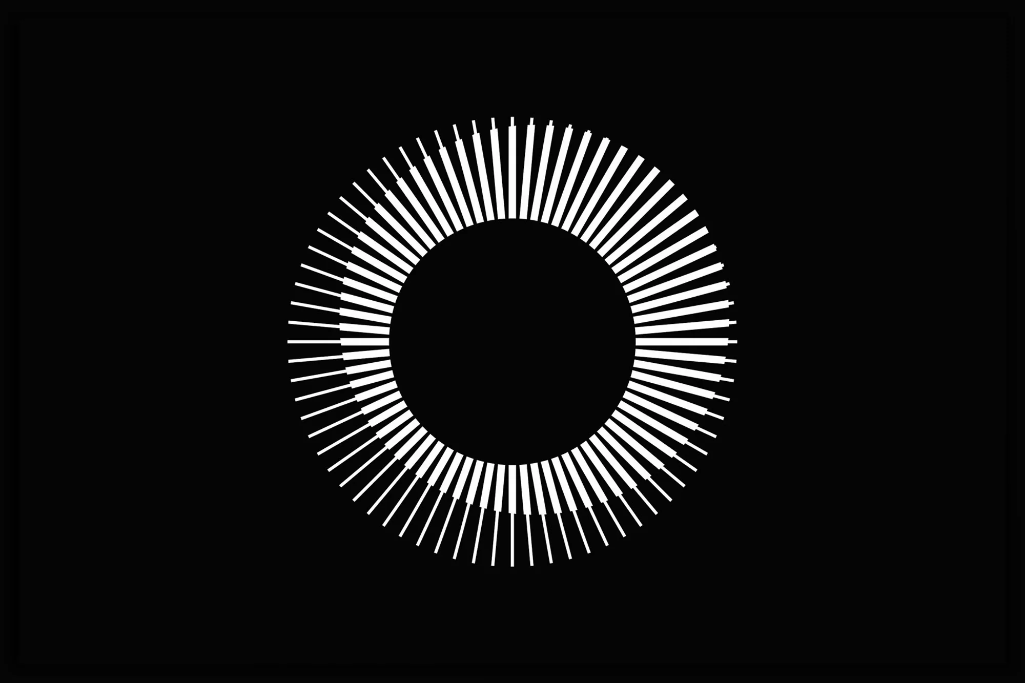 Abstract black and white graphic with a circle formed of evenly spaced short lines radiating outward on a black background.