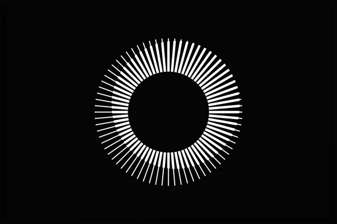 Abstract black and white graphic with a circle formed of evenly spaced short lines radiating outward on a black background.