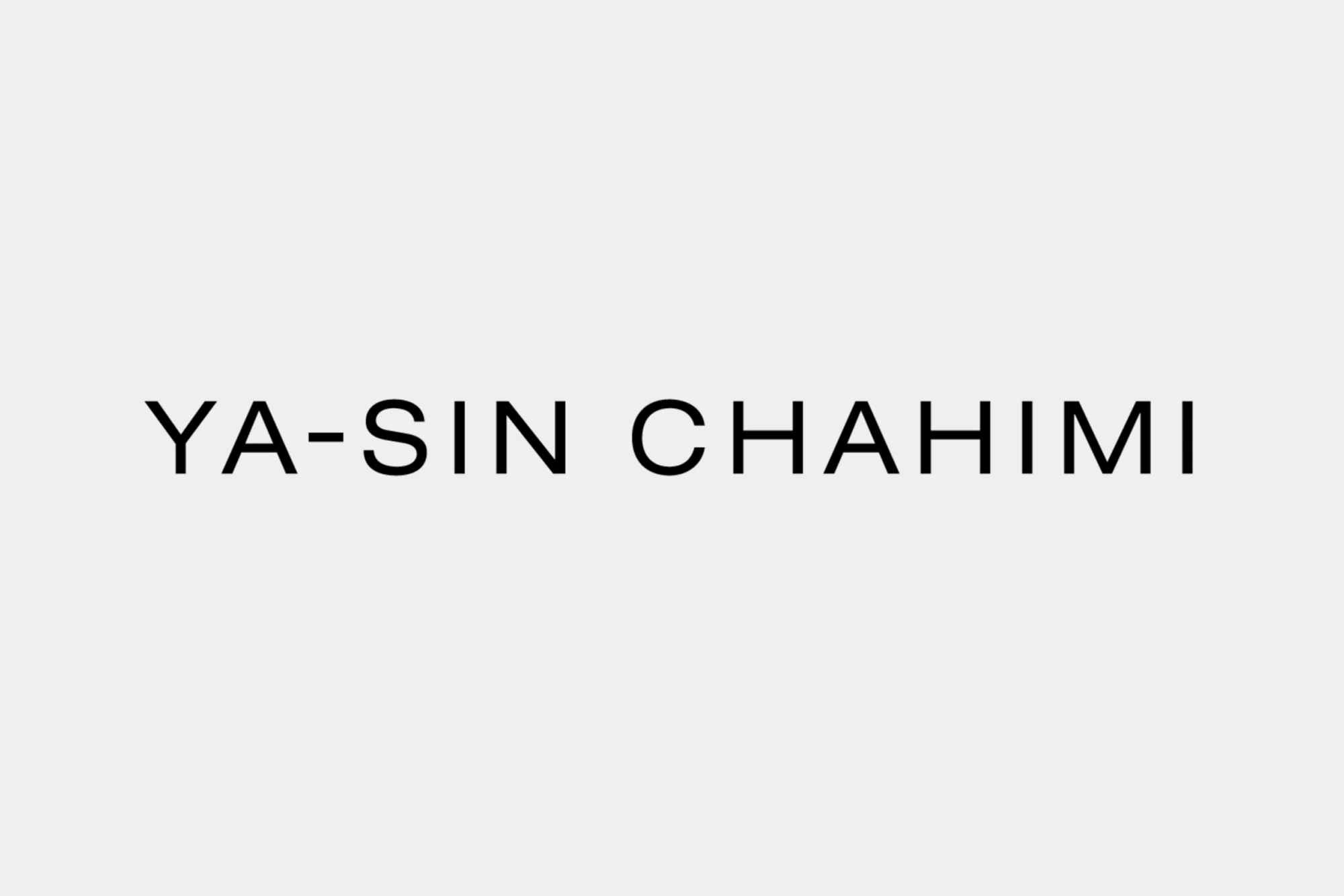 Black text 'YA-SIN CHAHIMI' on a white background. Graphic design element for branding or visual communication.