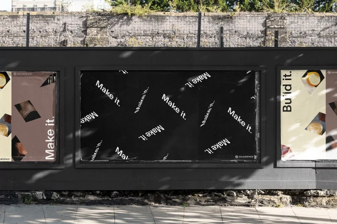 Outdoor billboard advertisement featuring Squarespace branding and the slogan 'Make it. Build it.' against a textured urban wall backdrop.