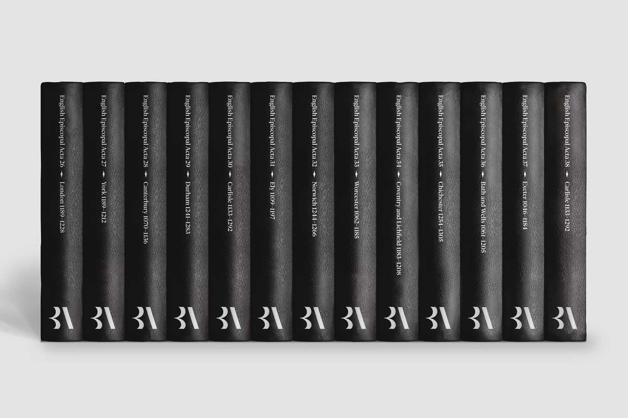 Collection of black English Episcopal Acta books displayed against a white background, showcasing their spines and printed titles.