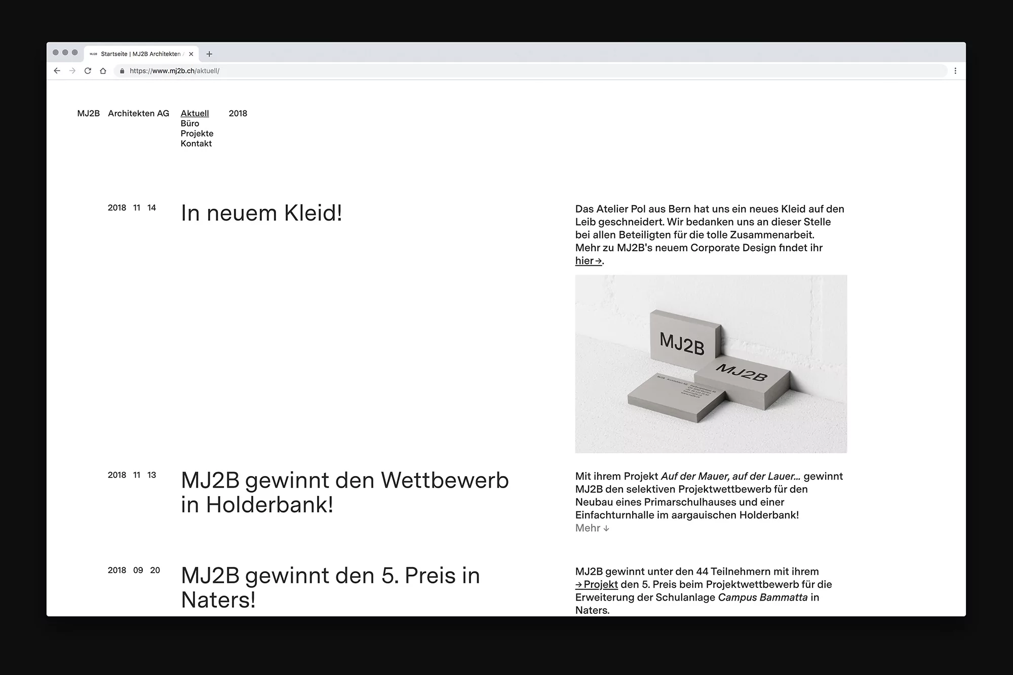 Website screenshot with MJ2B Architekten AG text, featuring architectural design and corporate updates, in a minimalist style, displaying text.