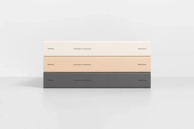 Three stacked presentation blocks in neutral hues (cream, tan, grey) feature text snippets, set against a pristine white background.