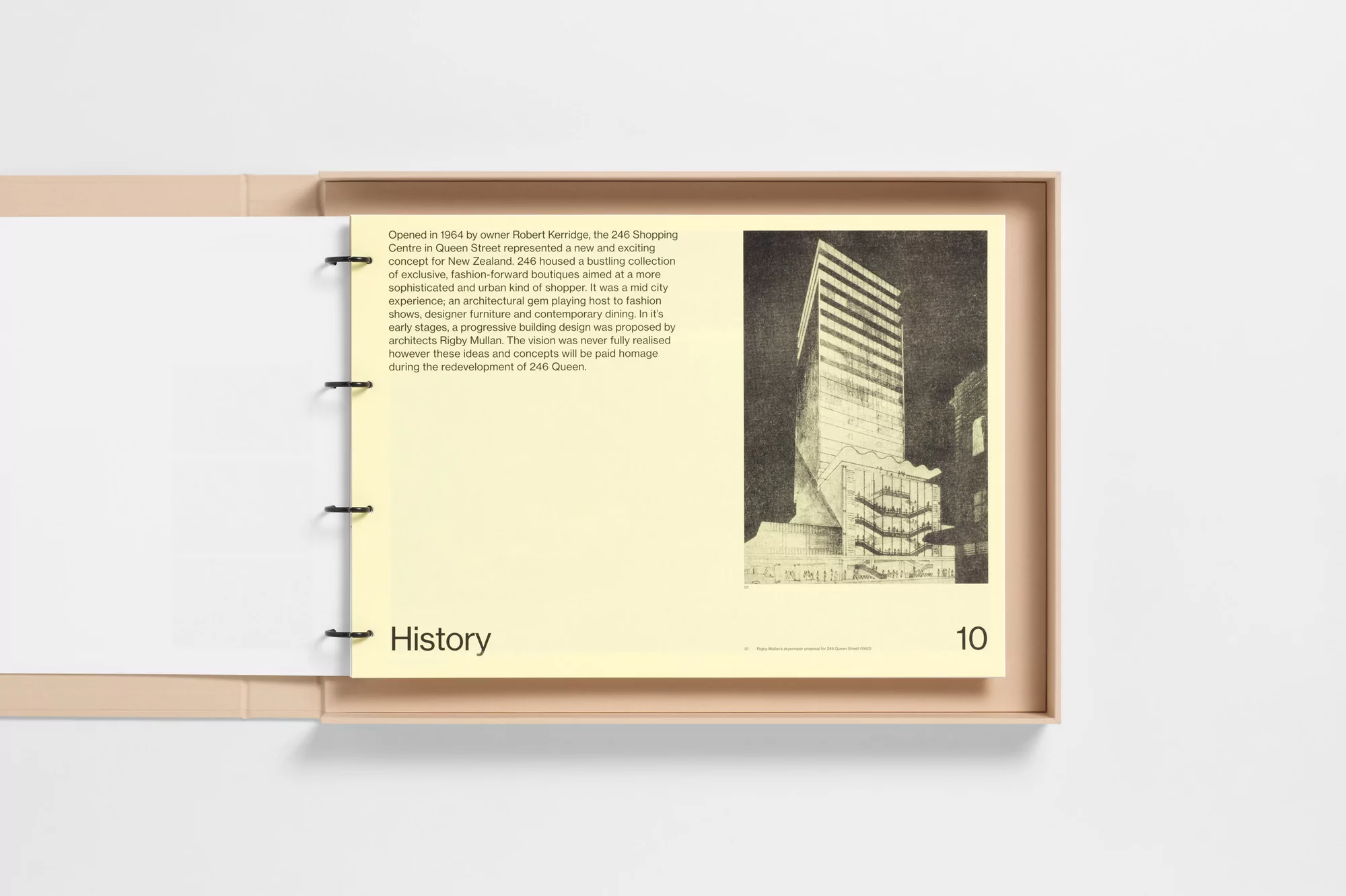 Architectural drawing in a tan binder shows a high-rise building design; architectural history and design concept in New Zealand.