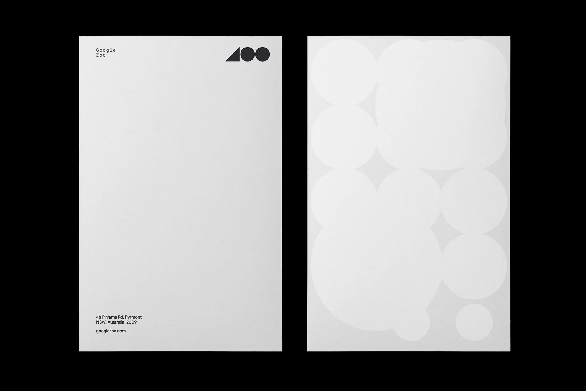 Two minimalist posters side-by-side: one with company branding, the other with geometric shapes in white and gray tones.