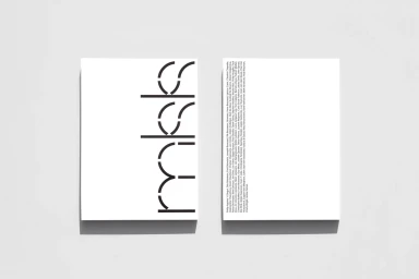 Two white rectangular cards featuring black typography and graphic design elements set against a light background.