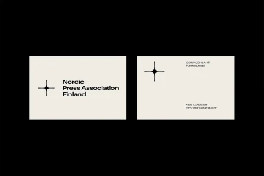 Two business cards with minimalist black typography and a four-pointed star logo on an off-white background