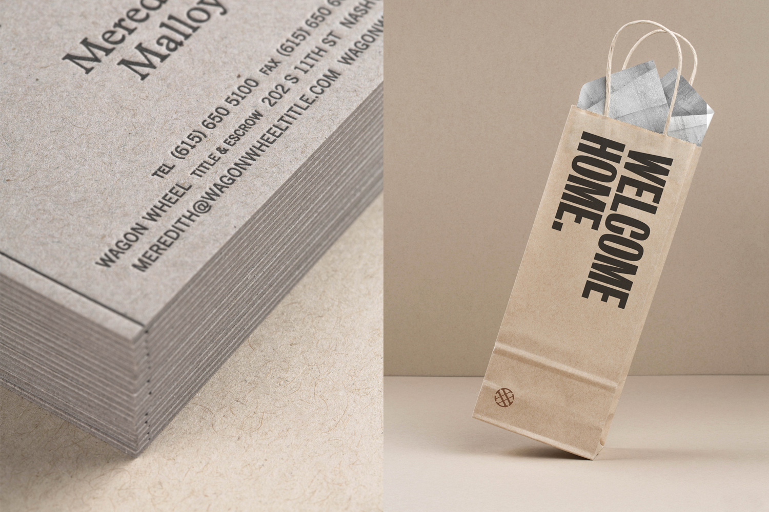 Close-up of stacked business cards with text on kraft paper next to a gift bag with Welcome Home text, set against a neutral background.