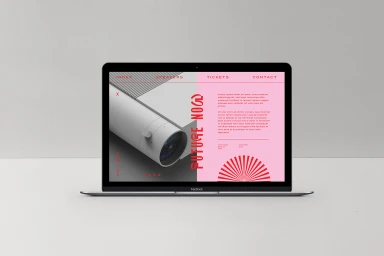 A laptop displaying the Future Now brand identity on a light grey background