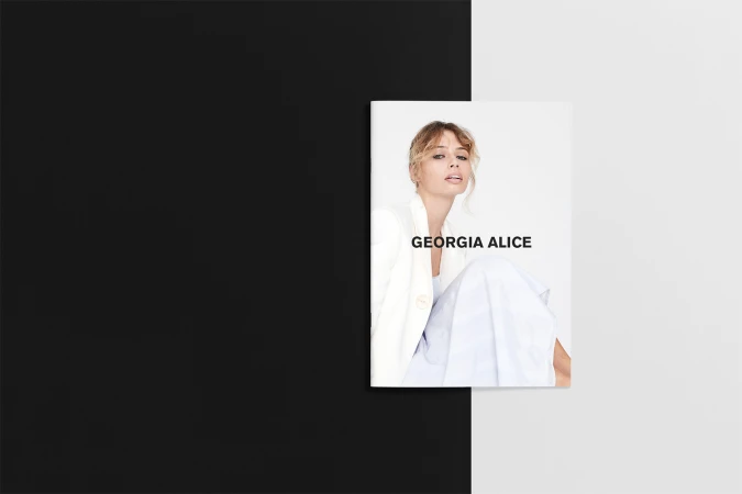 Book cover featuring a blonde woman in white blazer against a split black and white background for high-contrast visual interest.