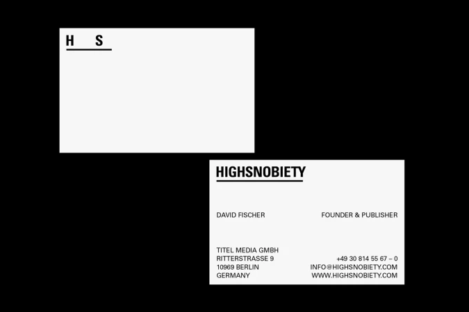 Highsnobiety business cards featuring company logo, contact information, and minimalist design against a stark black background.