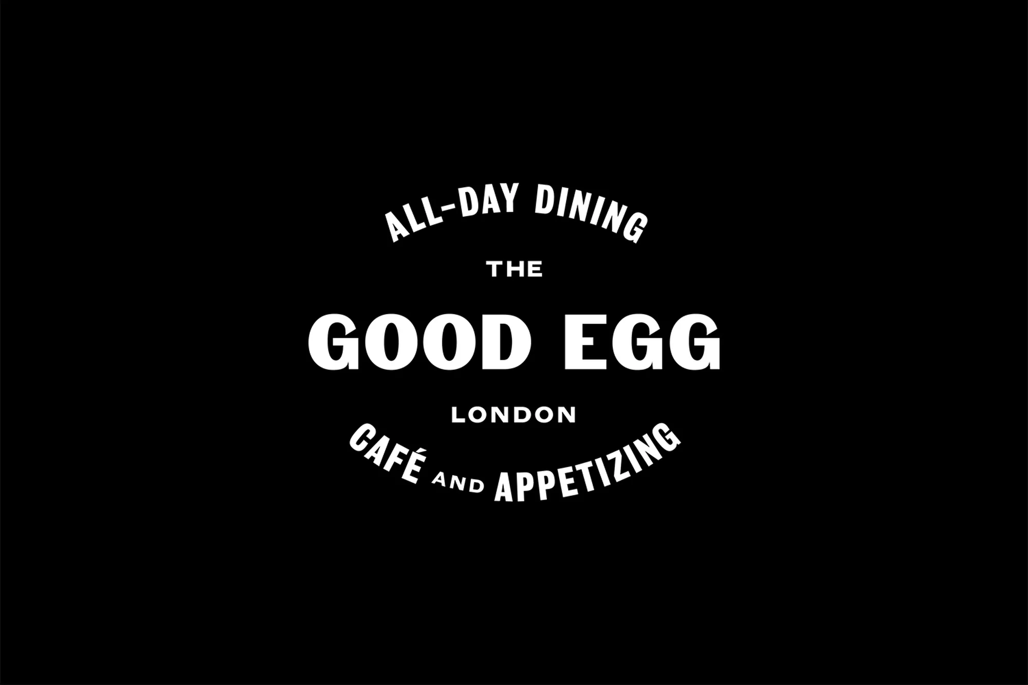 White typographic logo for The Good Egg set against a solid black background with curved text elements.