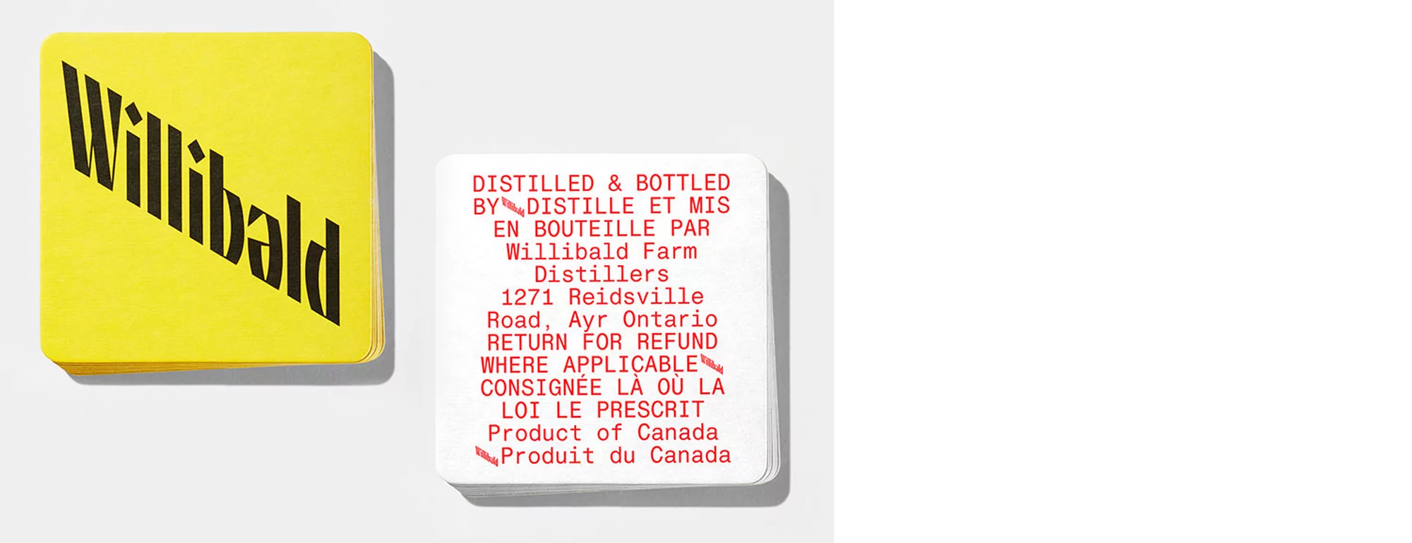 Two stacks of square cards. The yellow cards show 'Willibald' in black diagonal text. The white cards contain distilling information.