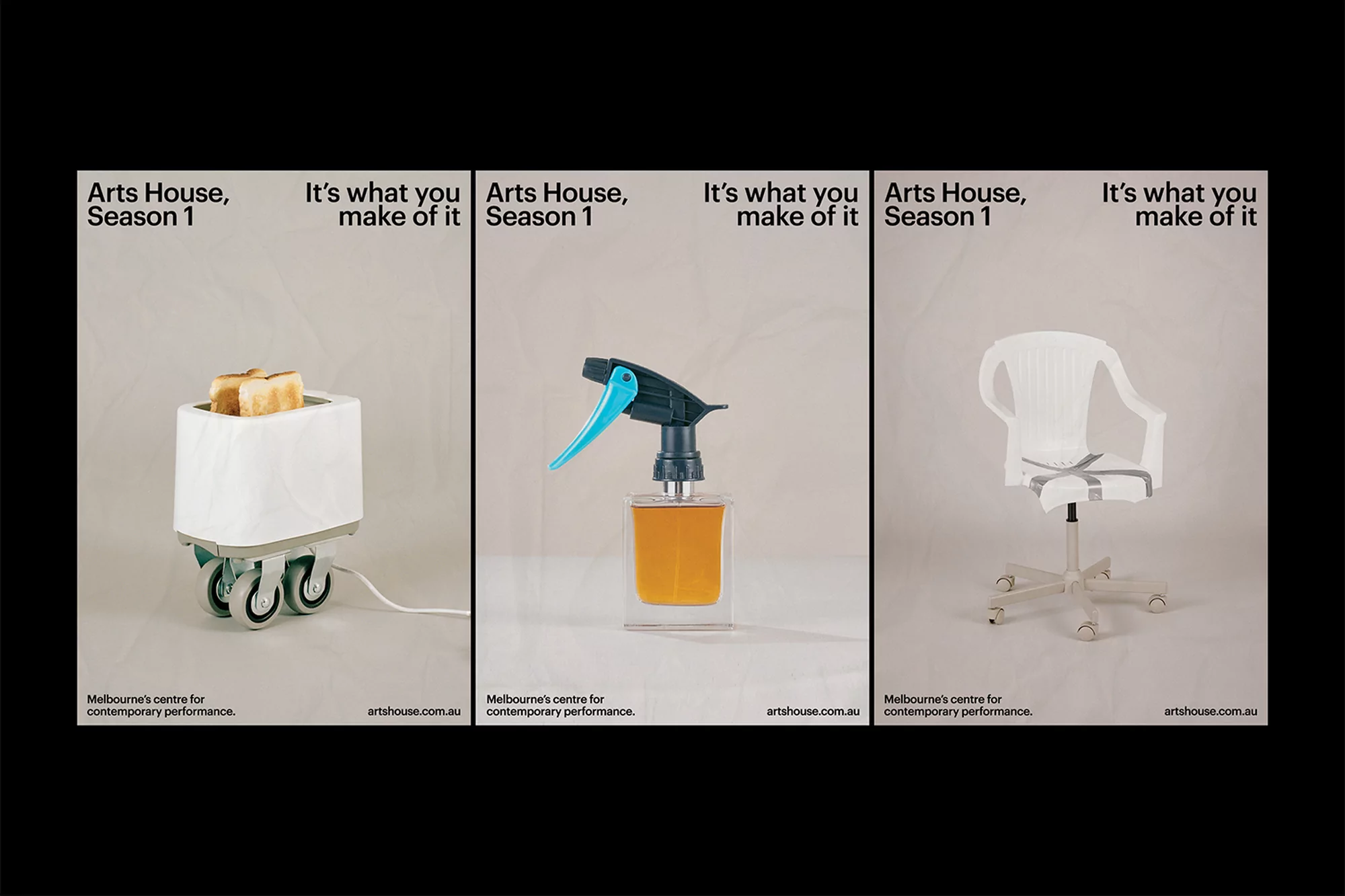 Art exhibit display featuring a toaster on wheels, a spray bottle, and an office chair, all isolated against a neutral backdrop.