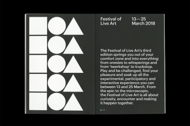 Open publication spread featuring white geometric shapes on the left page and typographic text on the right page.