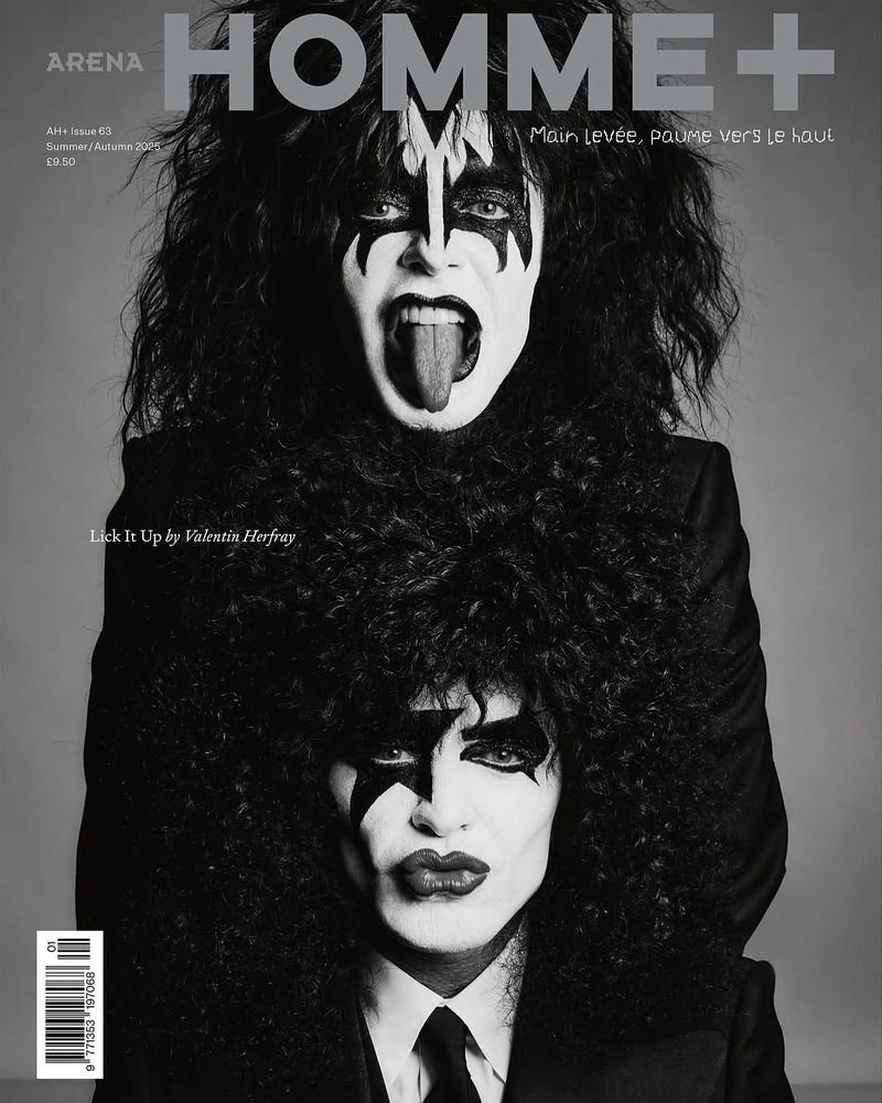 Arena Homme+ magazine cover featuring two adult males in black suits with white face paint and black hair in a photo studio setting.