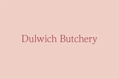 Minimalist brand identity graphic for Dulwich Butchery featuring red serif typography centered on a solid light pink background.