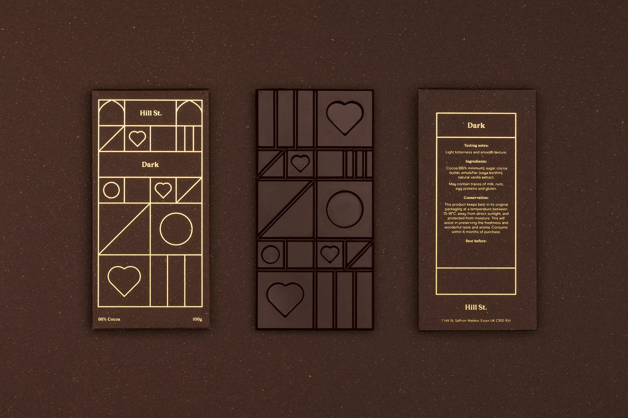 Three dark chocolate bars: one whole with a geometric design, plus front and back of a package with chocolate bar details.
