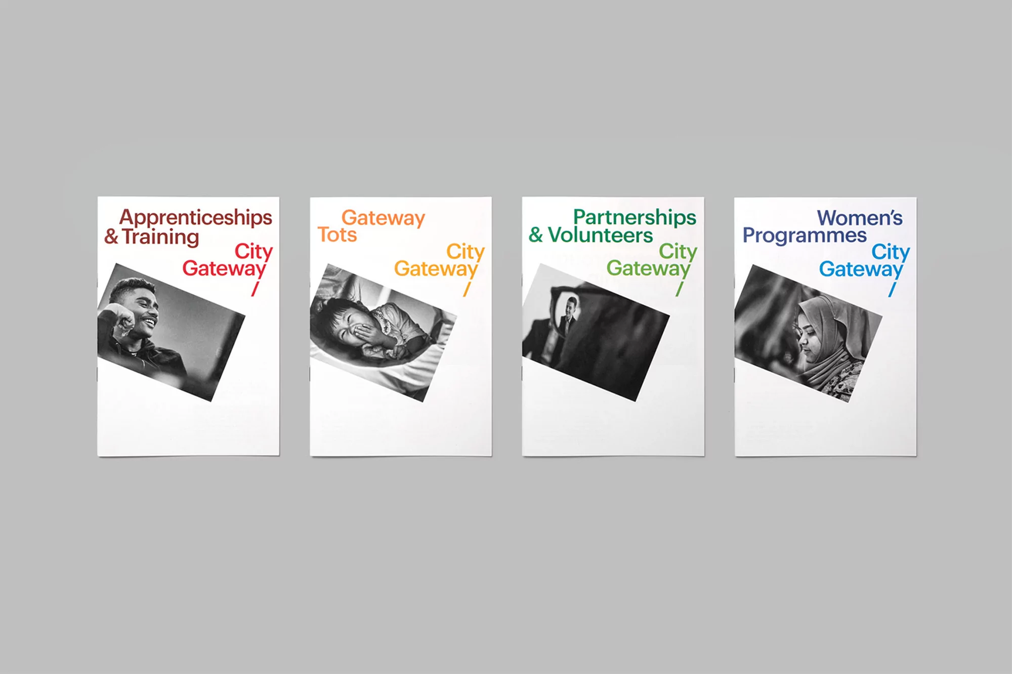 Four posters on a gray backdrop, each featuring black-and-white photos and colorful text for Apprenticeships, Tots, Volunteers, and Women's Programs.