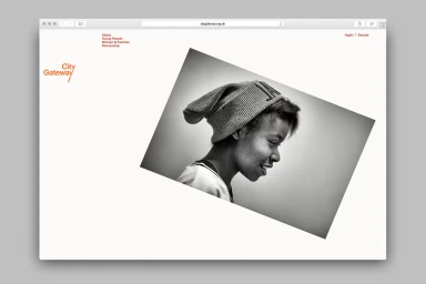 Browser window showing website brand identity for City Gateway featuring a tilted black and white portrait of a woman in a beanie