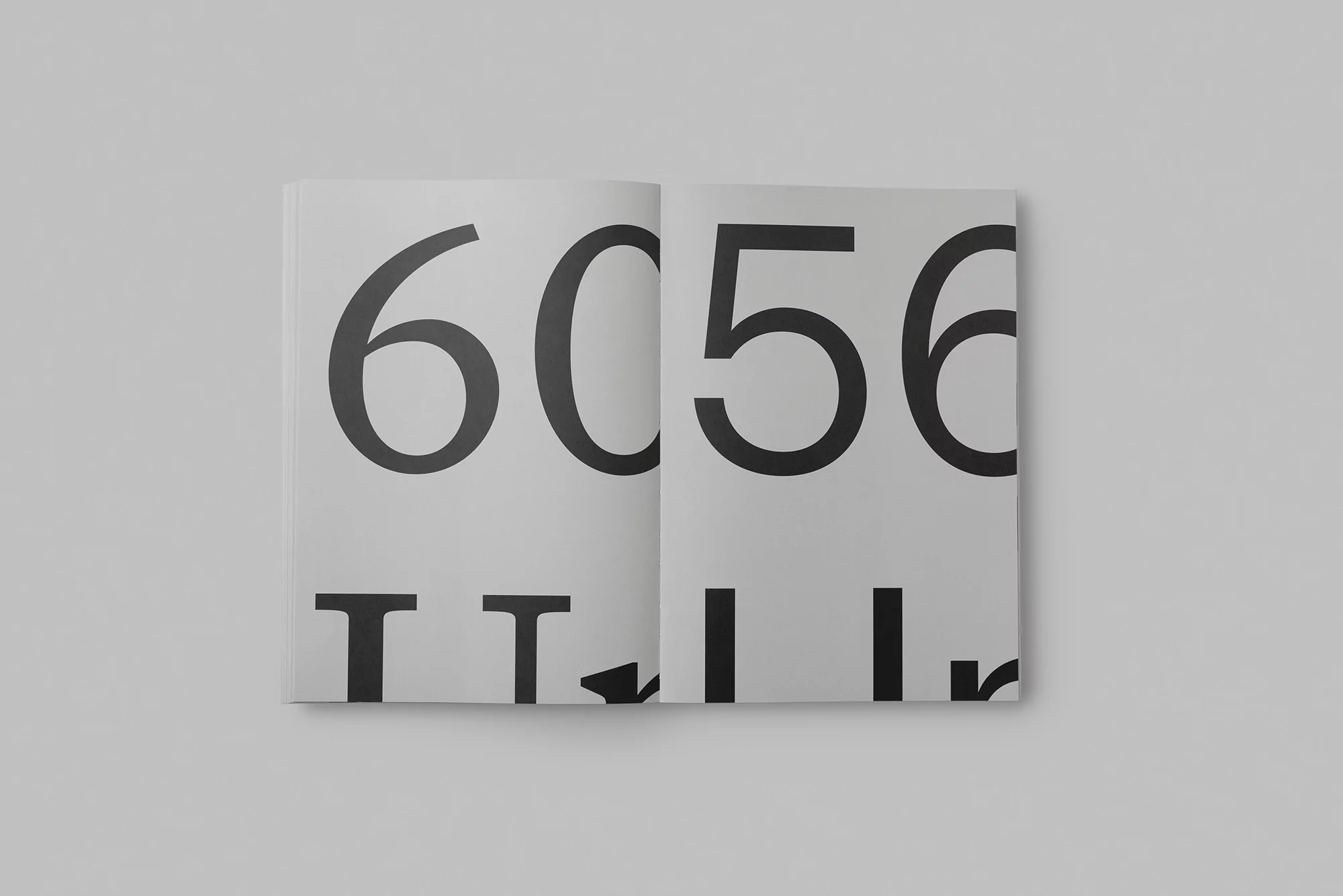 An open book displaying the numbers 6056 in bold black text against a white background, presented in a minimalist style.