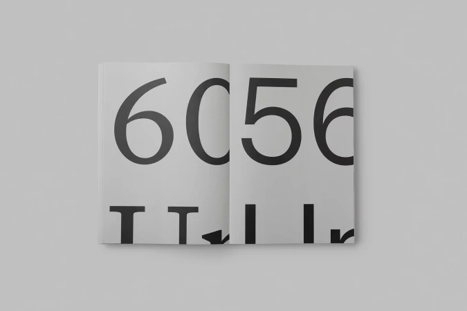 An open book displaying the numbers 6056 in bold black text against a white background, presented in a minimalist style.