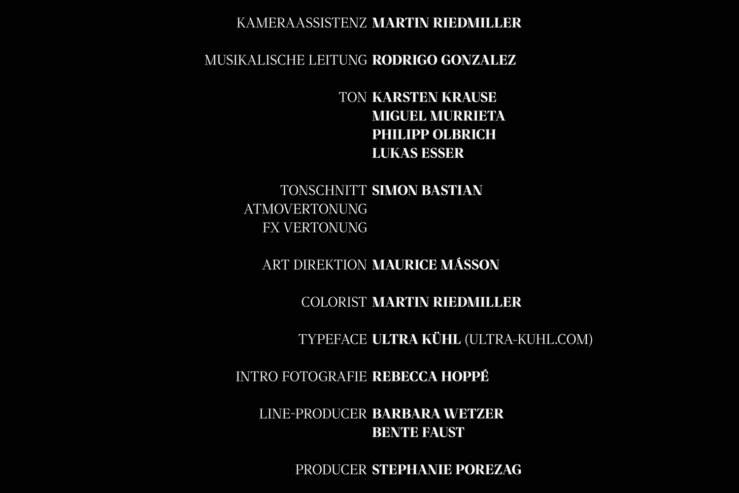 Black background with white text displaying film credit titles: names and roles like camera assistant, music direction, and art direction.