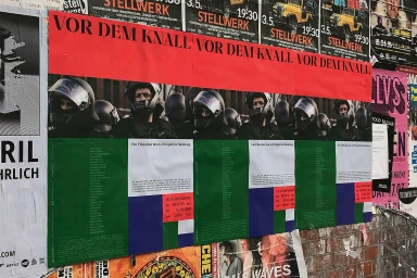 Wheatpaste poster featuring repeating rows of riot police officers wearing helmets against a brick wall.